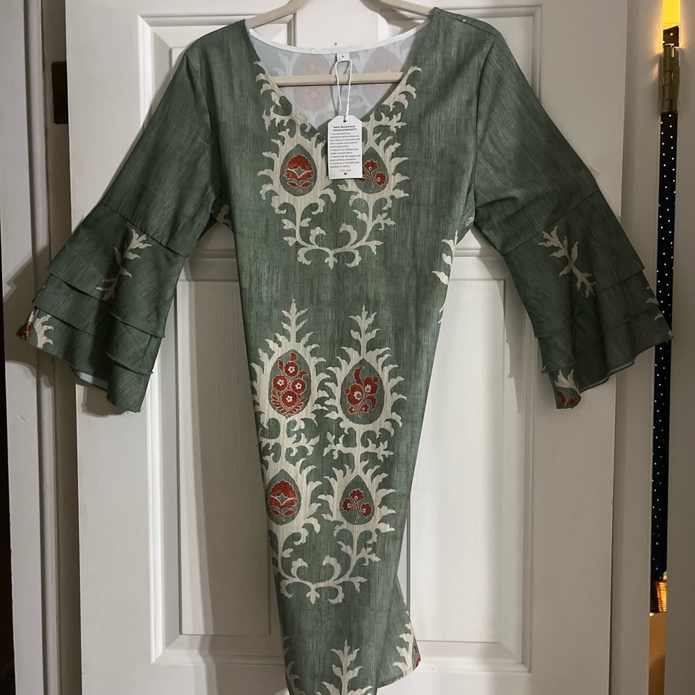 Elegant Green and Cream Dress with Floral Design